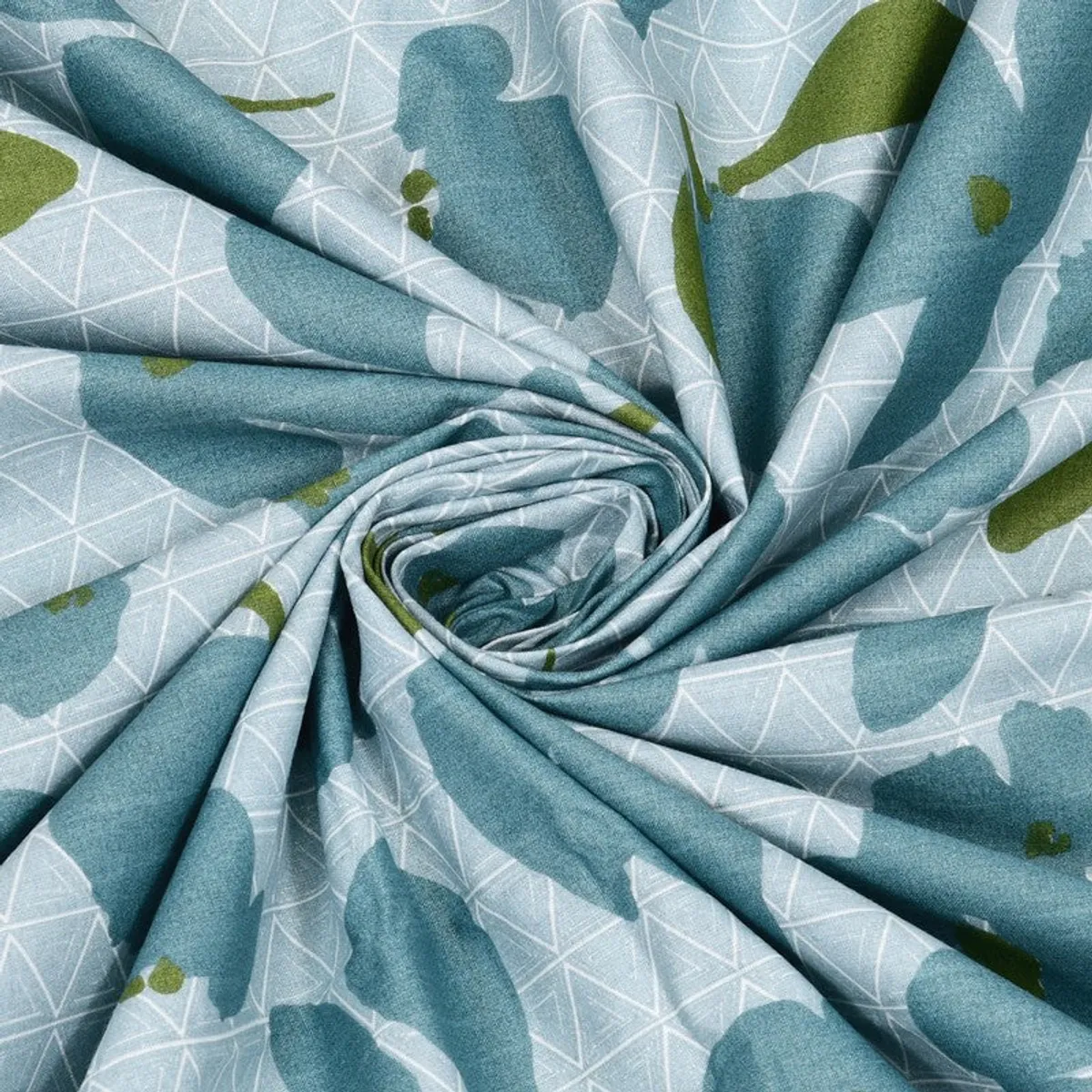 Close-up of blue and green floral cotton fabric with geometric lines