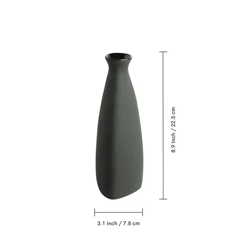 Single black tapered vase on a white background
