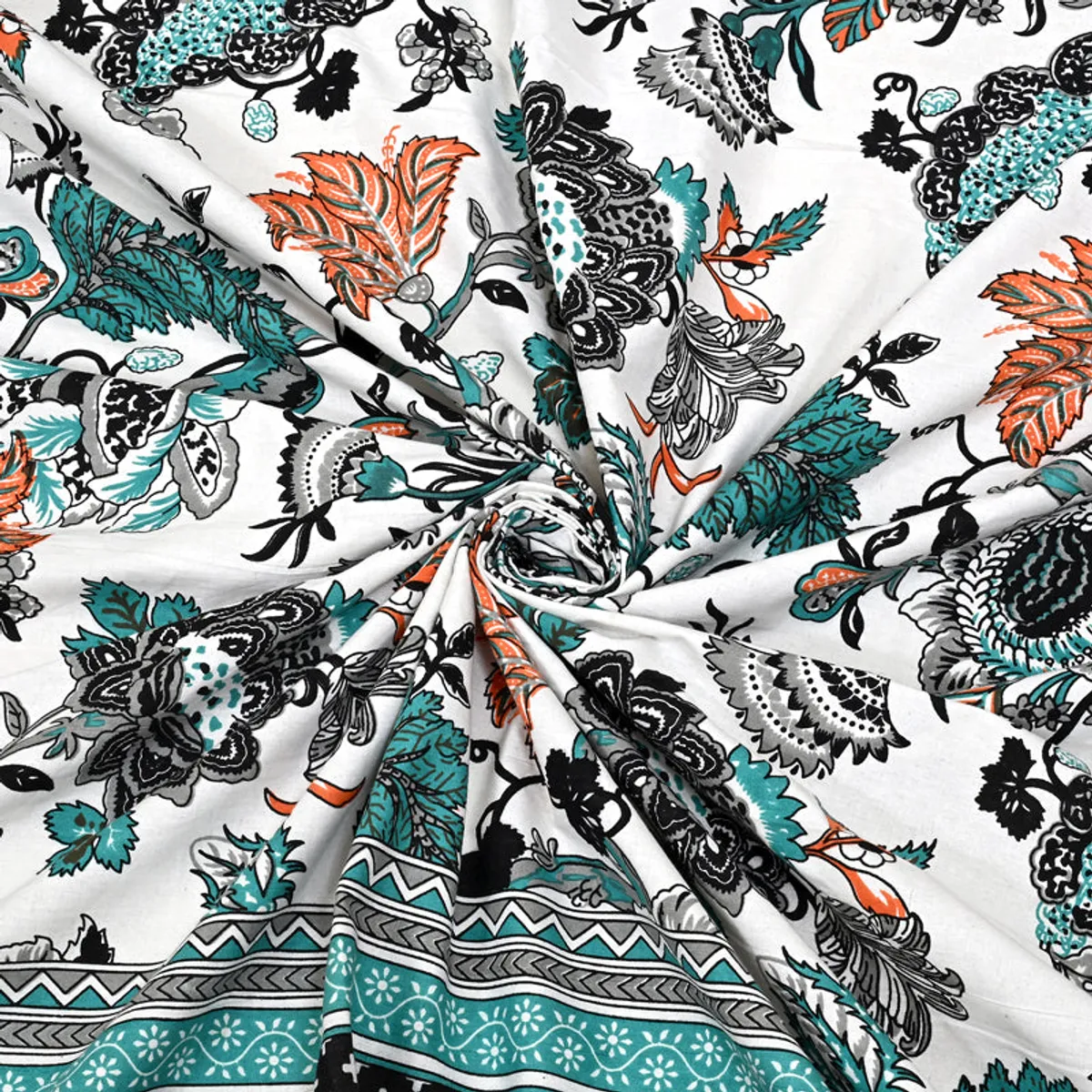 Twisted fabric close-up showing the floral print of the bedsheet