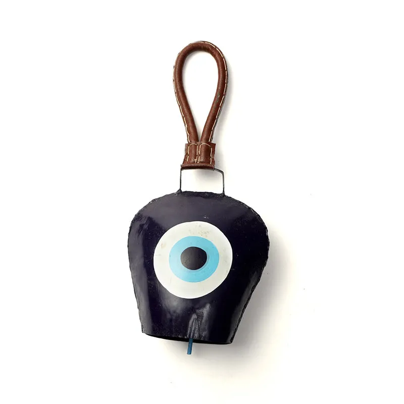 Front-facing black metal bell with a blue and white eye design