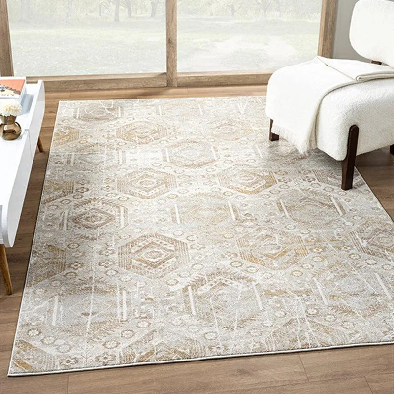 Beige and brown abstract carpet styled in a living room beside a white chair