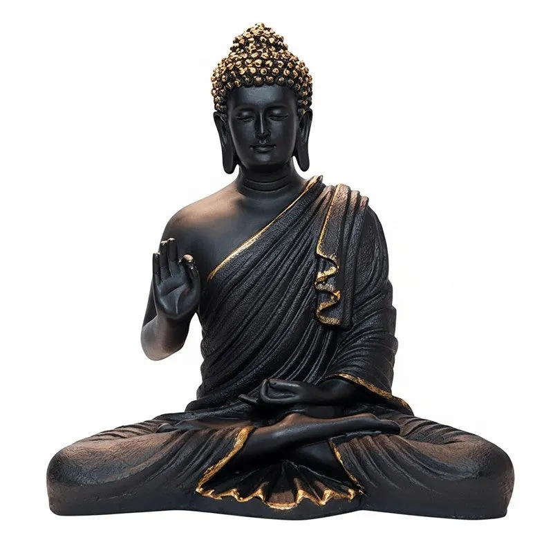 Front view of a black and gold seated Buddha marble idol