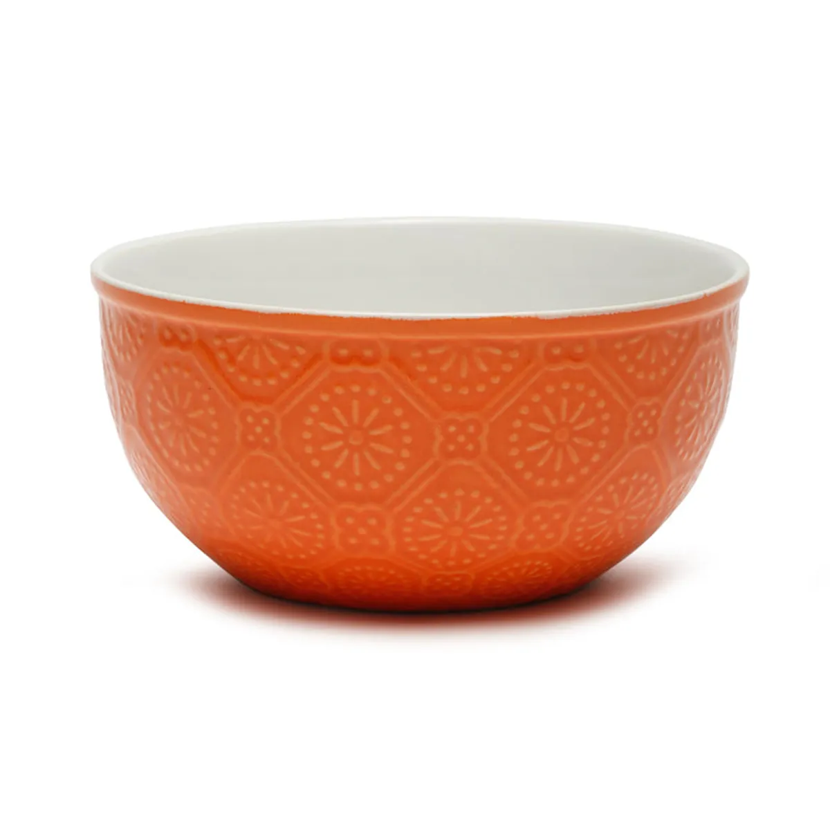 Close-up of the orange ceramic bowl with a raised geometric pattern