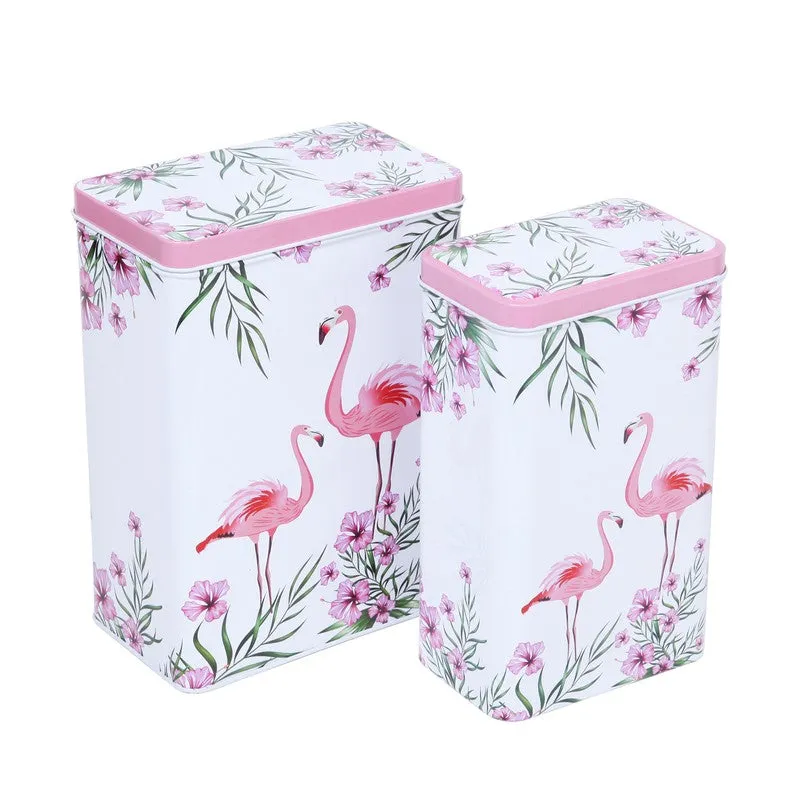 Angled view of two pink and white storage boxes with printed motif