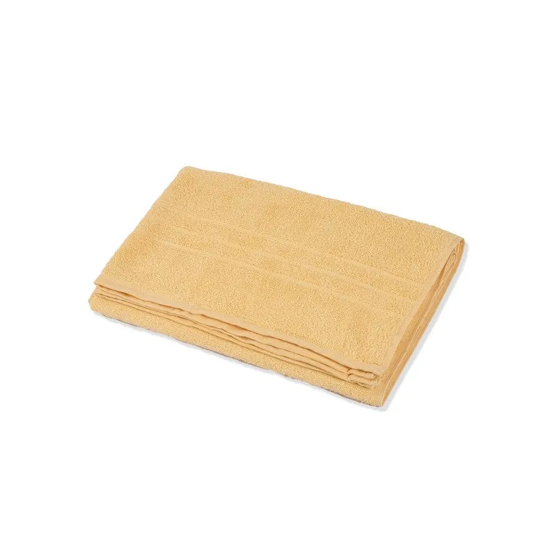 Folded yellow bath towel shown against a white background