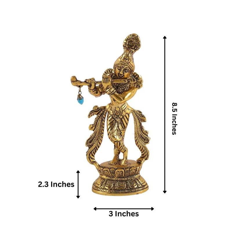 Gold-toned Krishna idol shown against a plain background