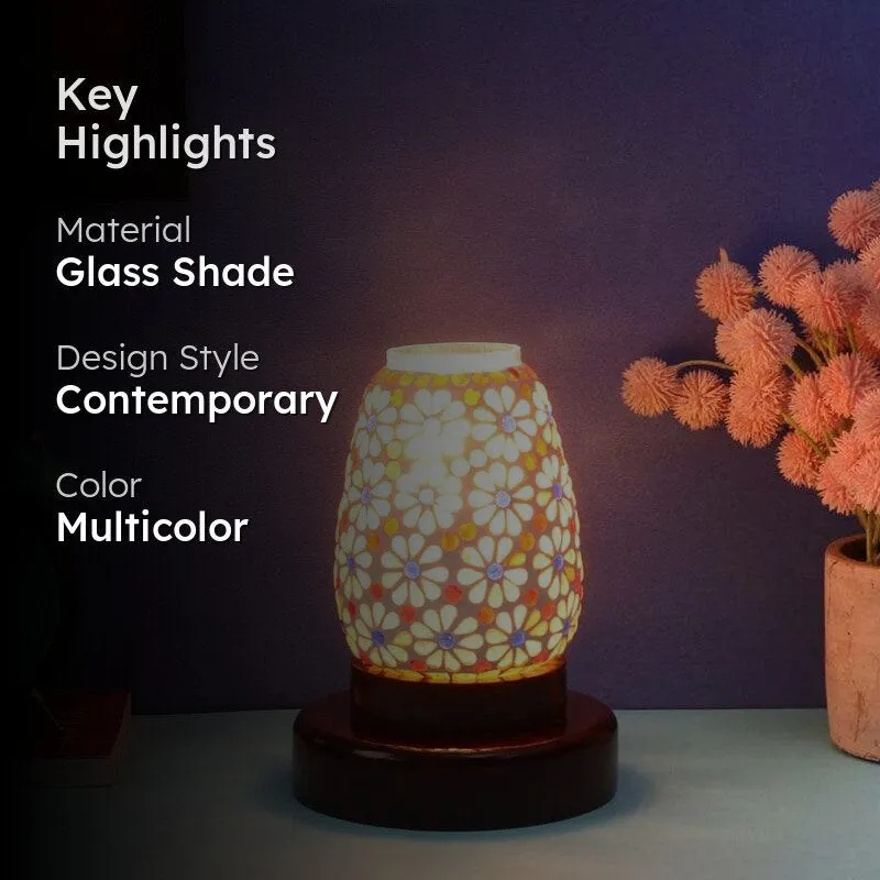 Lit floral glass table lamp with highlight text overlay