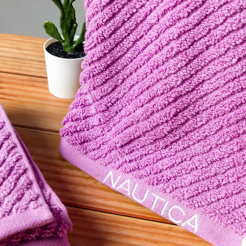 Close-up of lilac towel showing diagonal ribbed texture and border