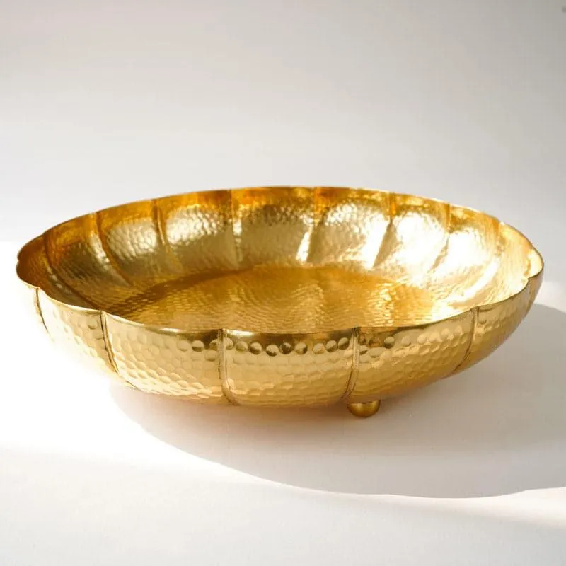 Empty gold hammered urli with petal-shaped rim