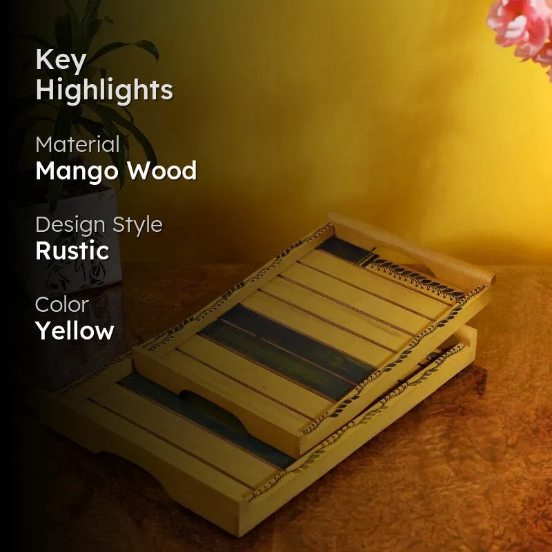 Yellow and green serving trays styled on a table against a yellow backdrop
