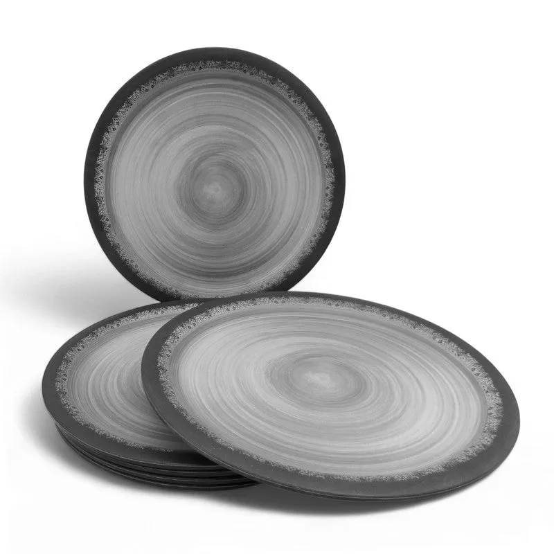 Three black and grey circular dinner plates arranged against a white background