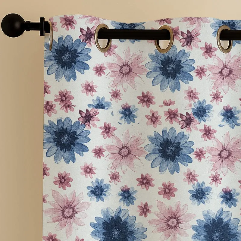 Close-up of the blue and pink floral curtain fabric and eyelets.