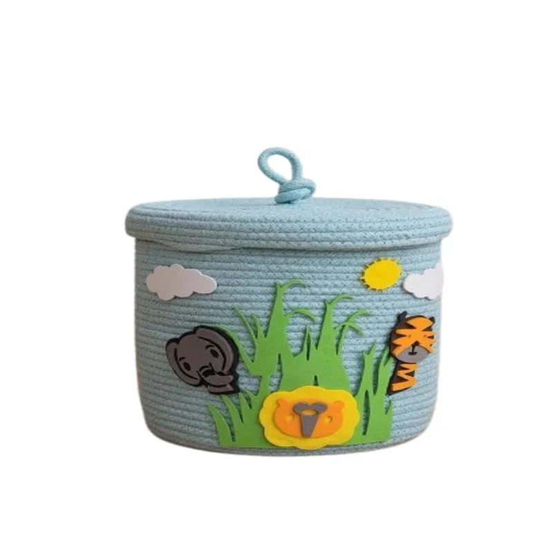 Blue cylindrical cotton storage basket with lid and jungle animal design