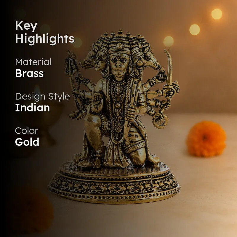 Gold Panchmukhi Hanuman idol styled with warm lights and marigold flowers