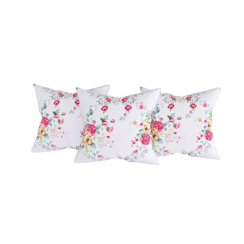 Three floral cushion covers on a white background