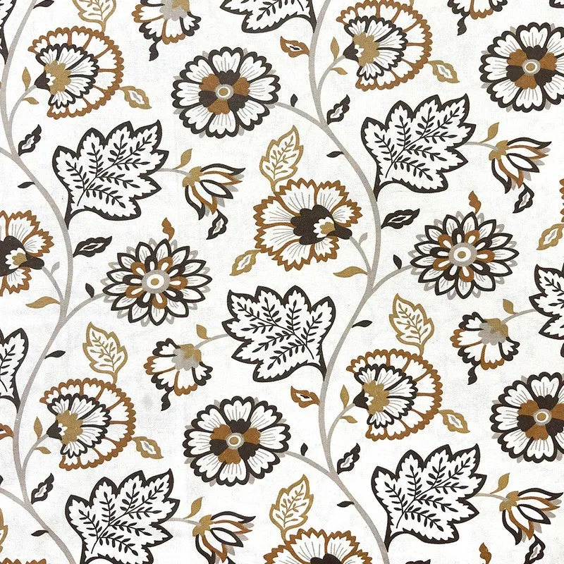 Close-up of the white and brown floral print on the bedsheet fabric