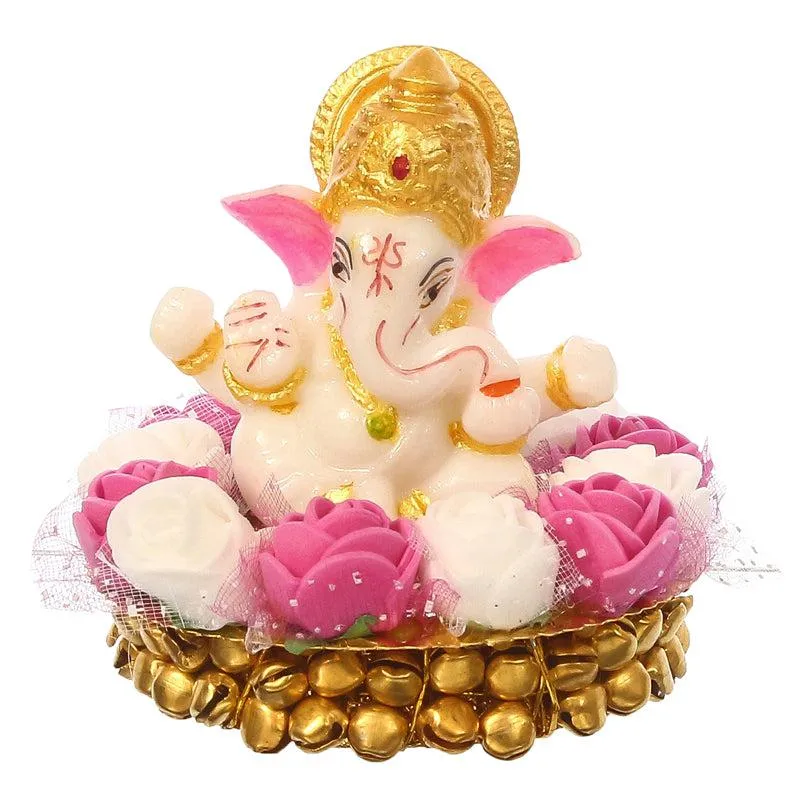 Front view of white and pink Lord Ganesha tealight holder with gold detailing