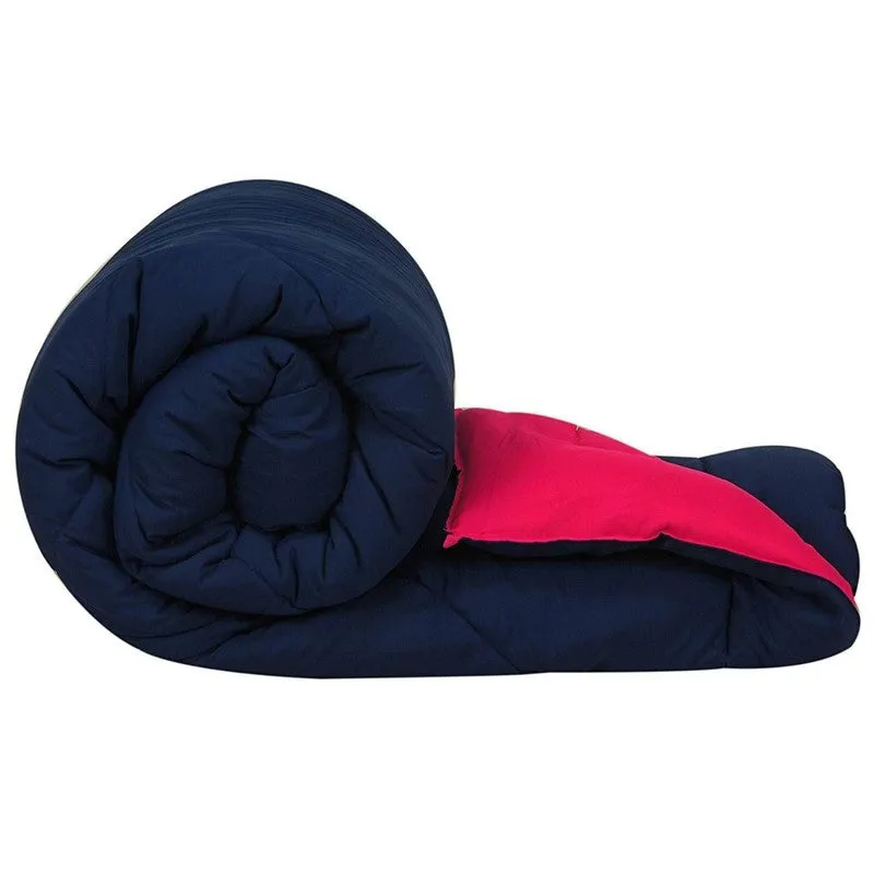 Rolled blue and pink reversible comforter showing both coloured sides