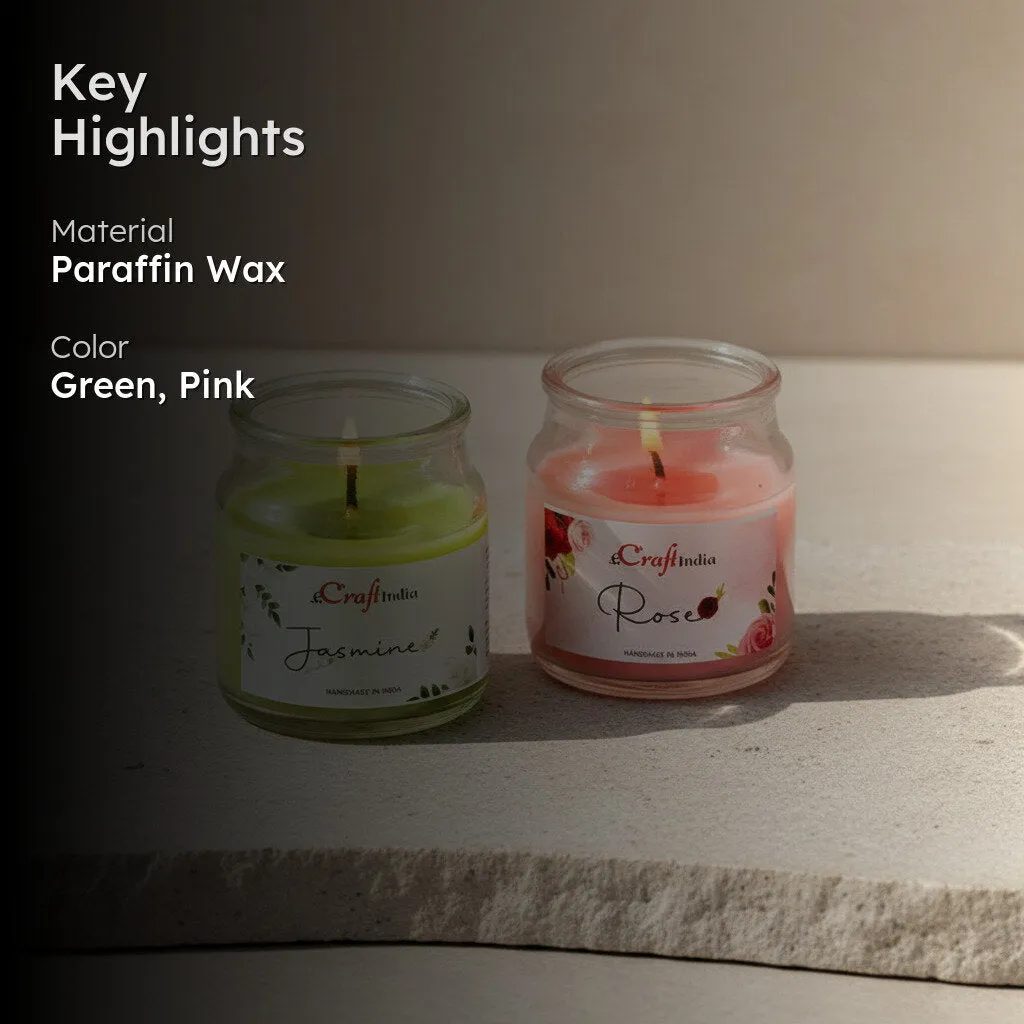 Green and pink jar candles styled on a stone surface