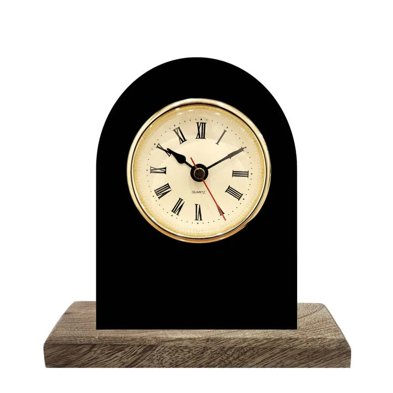 Front view of black iron table clock on a natural wood base
