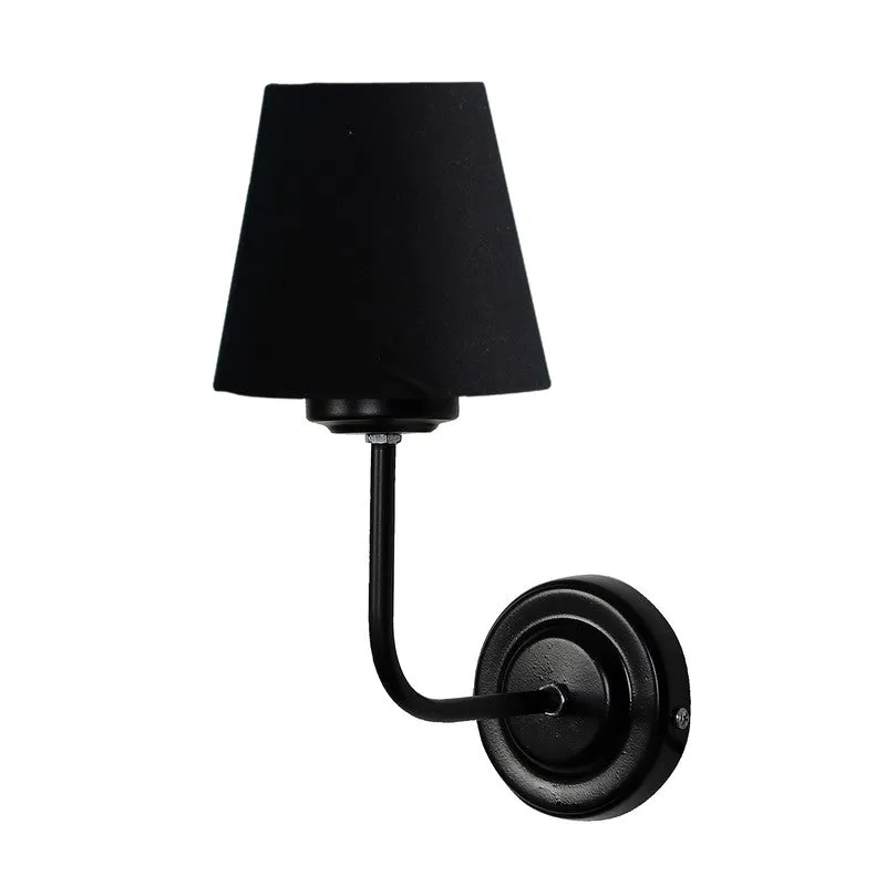 Angled view of black wall lamp with curved arm and tapered shade