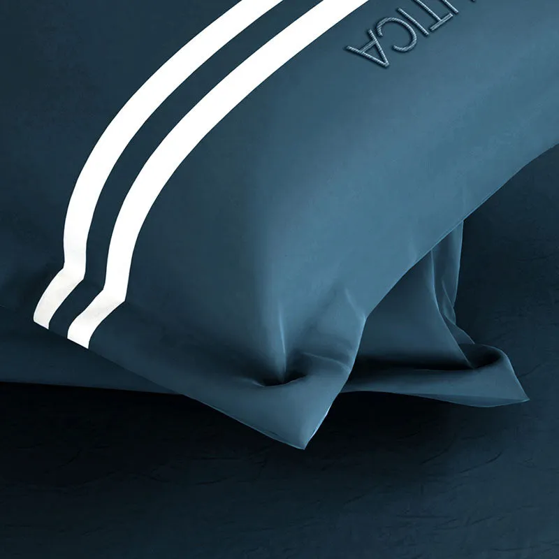 Close-up of navy fabric and curved white stripe detailing
