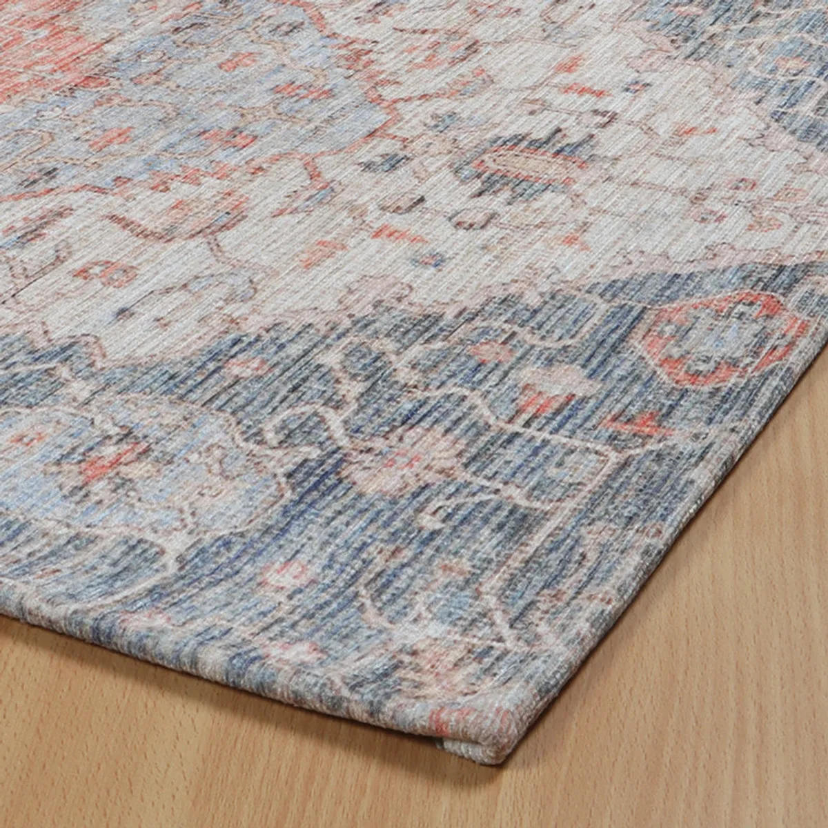 Close-up showing the soft textured surface and printed pattern of the doormat