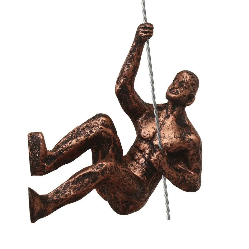 Front view of bronze figurative wall accent holding a twisted rope