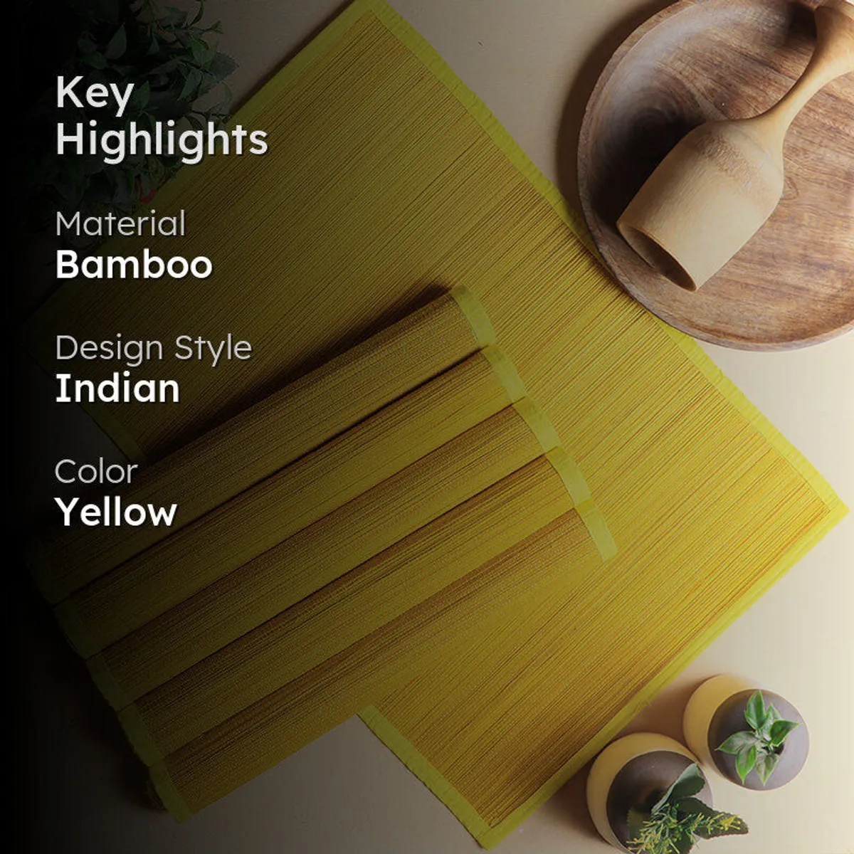 Yellow bamboo table mats styled with wooden accessories and greenery