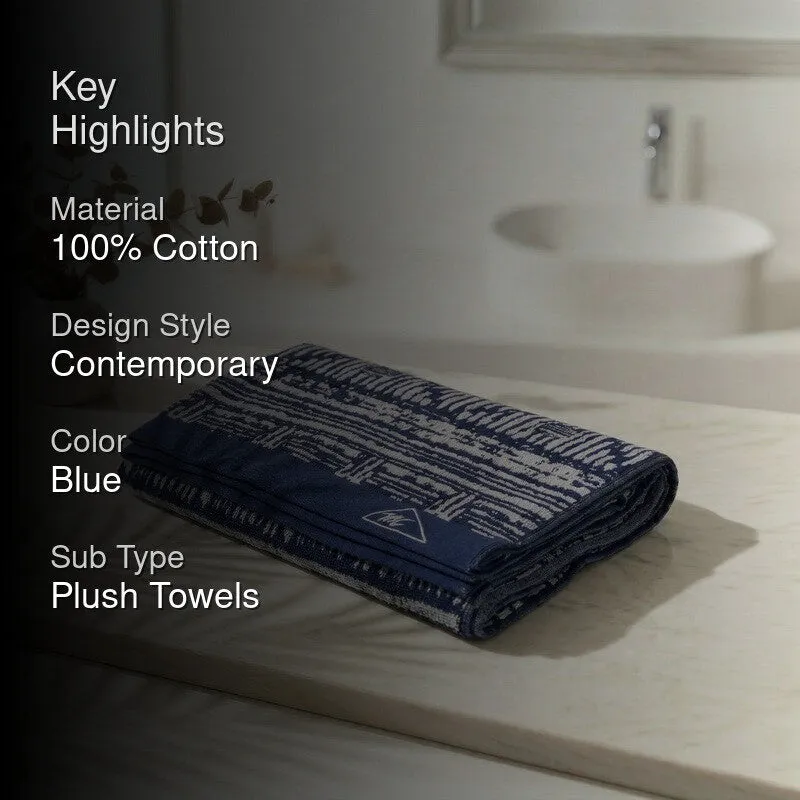 Blue bath towel with key highlights text overlay in a bathroom setting