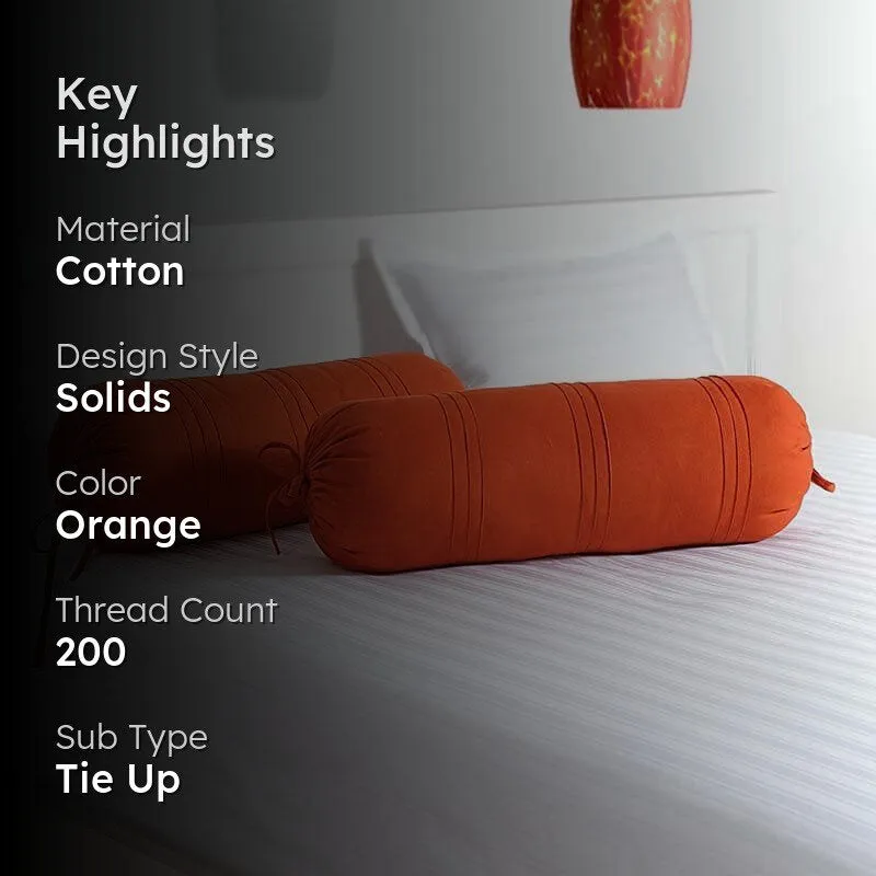 Orange bolster covers on a bed with key highlights text overlay