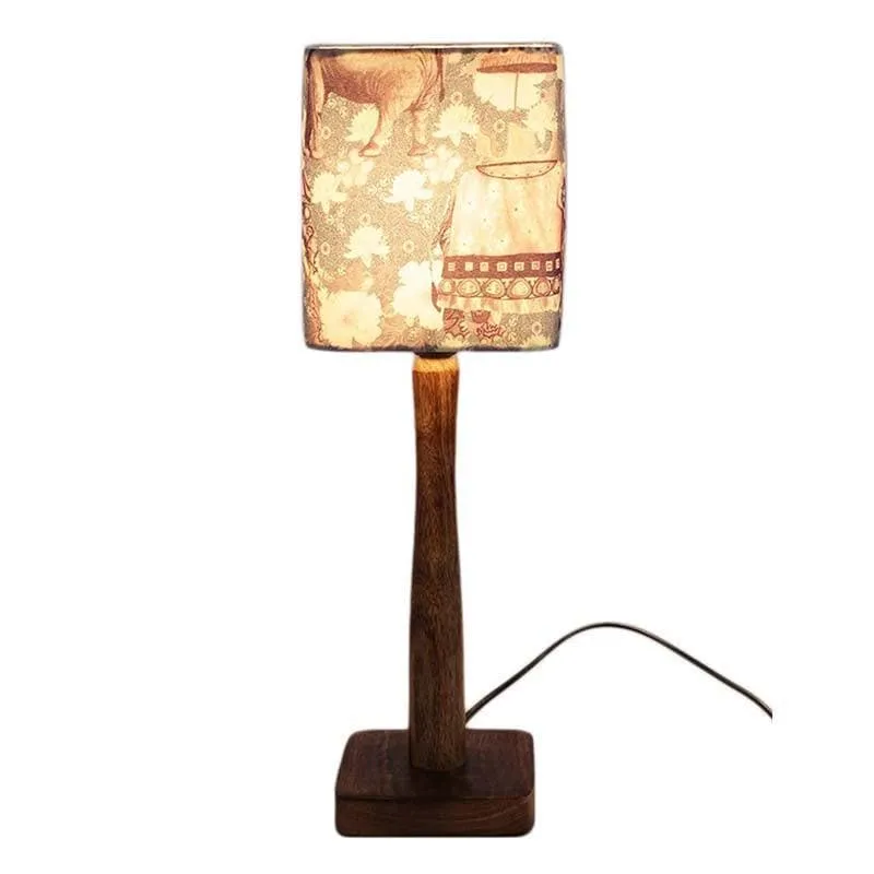 Front view of multicolour fabric table lamp with wooden base and cord