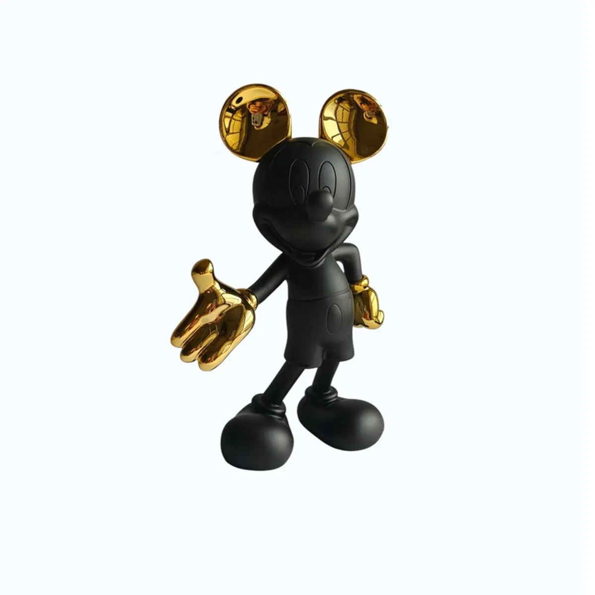 Front view of the black and gold character-inspired tabletop showpiece