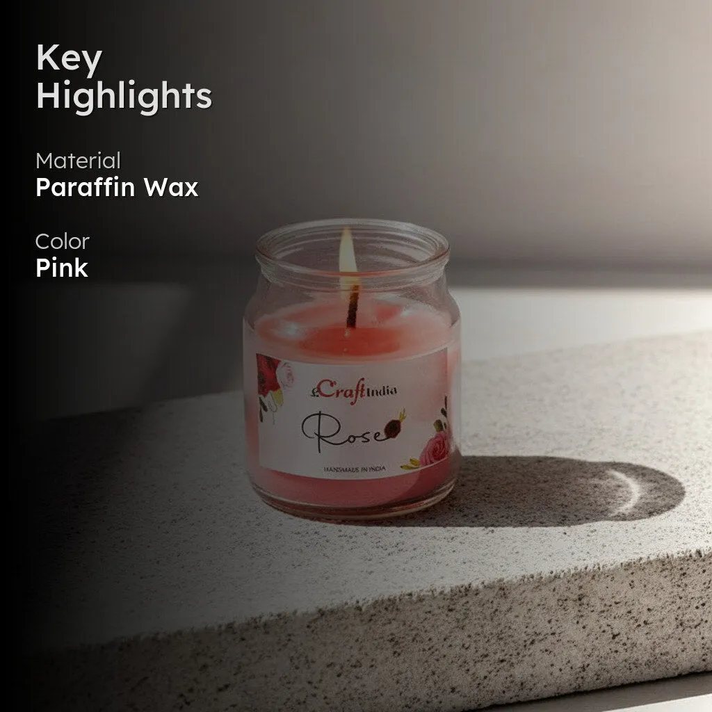 Pink jar candle placed on a surface in soft light
