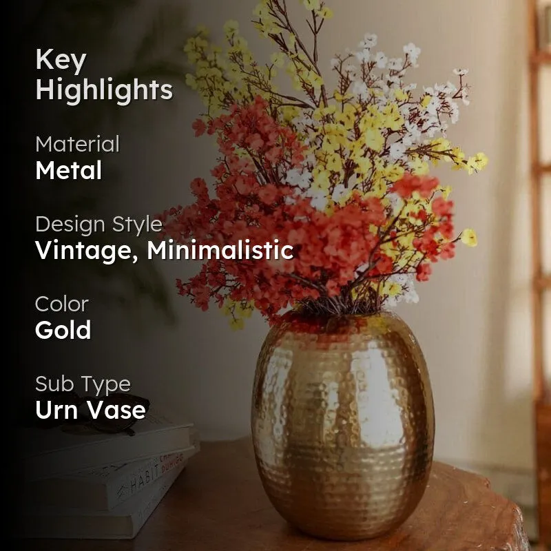 Gold hammered vase with flowers and a dark highlight overlay