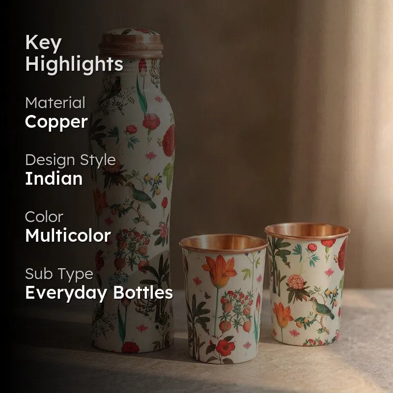 Floral copper bottle and two matching tumblers in a styled product view