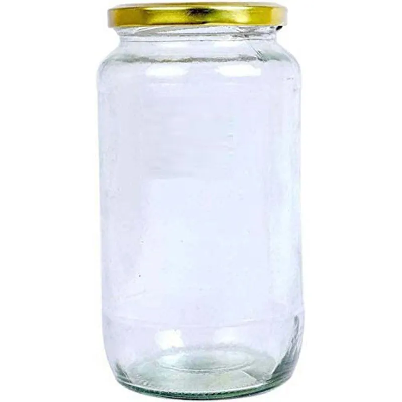 Transparent cylindrical glass jar with a gold-coloured lid