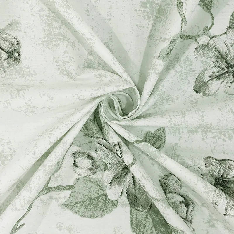 Twisted fabric close-up showing the floral print and soft colour palette