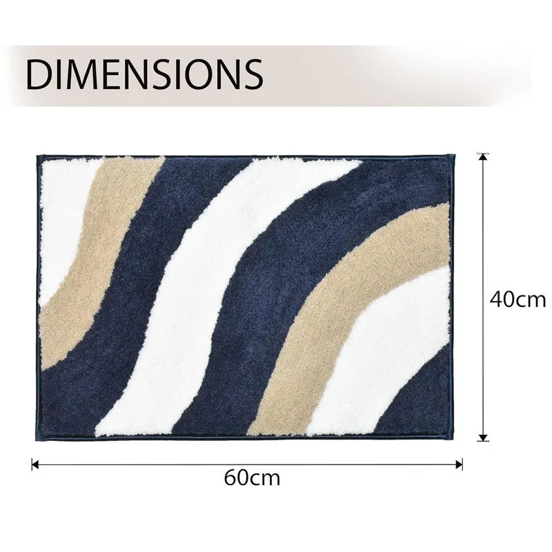 Front view of the rectangular bath mat with blue, white and beige wavy design