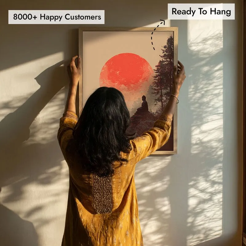 Person holding up a framed Buddha wall art in sunlight
