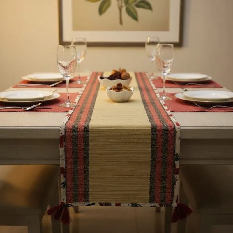 Beige and red runner styled on a dining table with six place settings