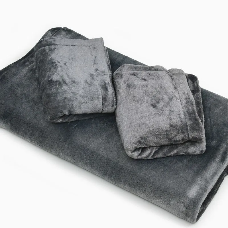 Folded black and grey bedsheet with two matching pillow covers