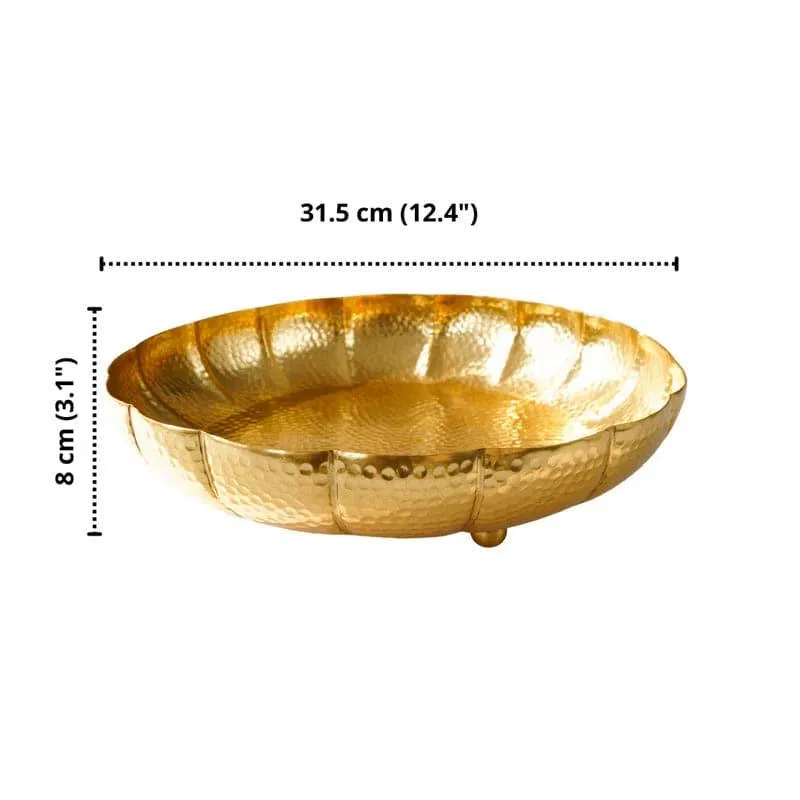 Gold hammered urli shown with size markings