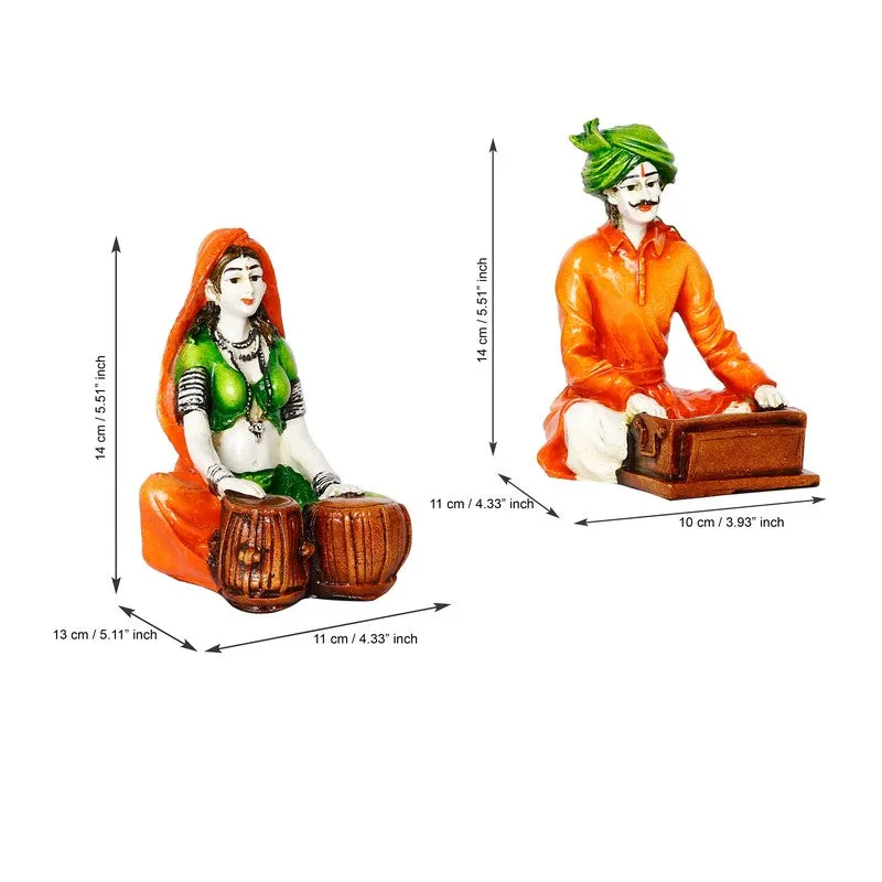 Two colourful figurines shown with measurement arrows on a white background