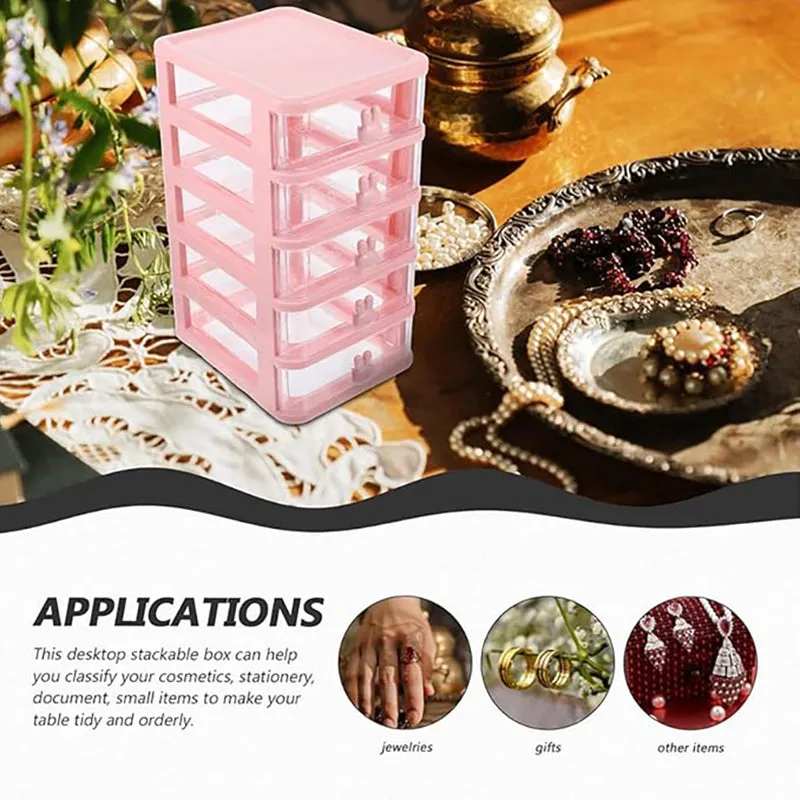 Pink five-tier organiser styled beside jewellery and decorative items