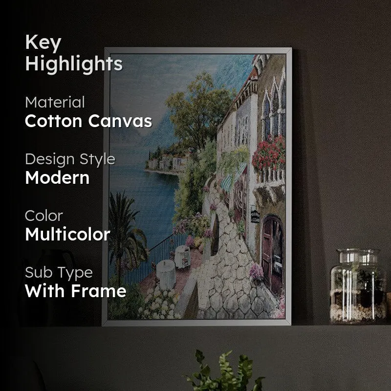 Framed coastal village wall art styled in a living room setting