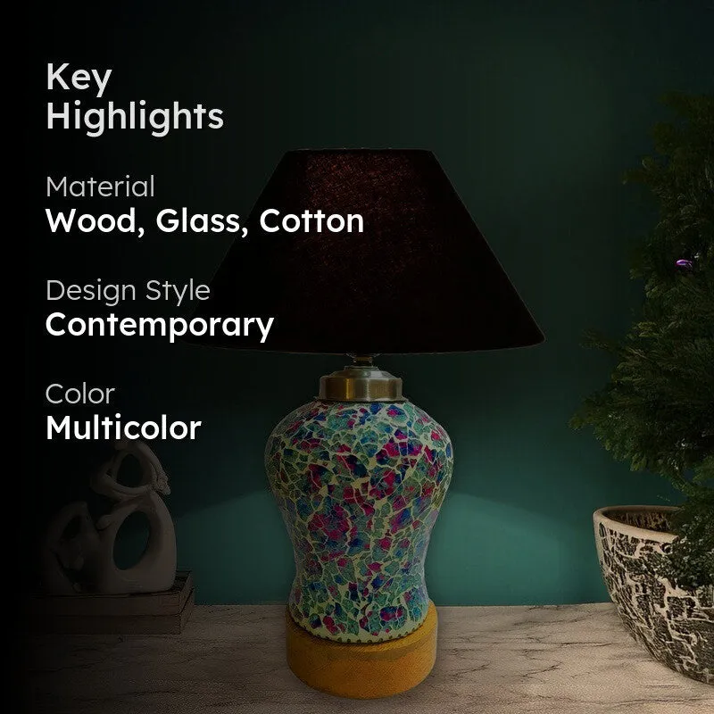 Contemporary multicolour table lamp with black shade in a styled setting