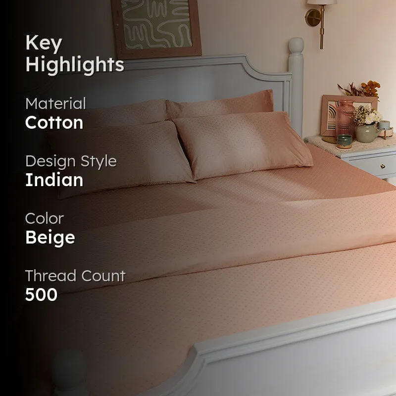 Peach dotted duvet cover on a bed with key highlights overlay
