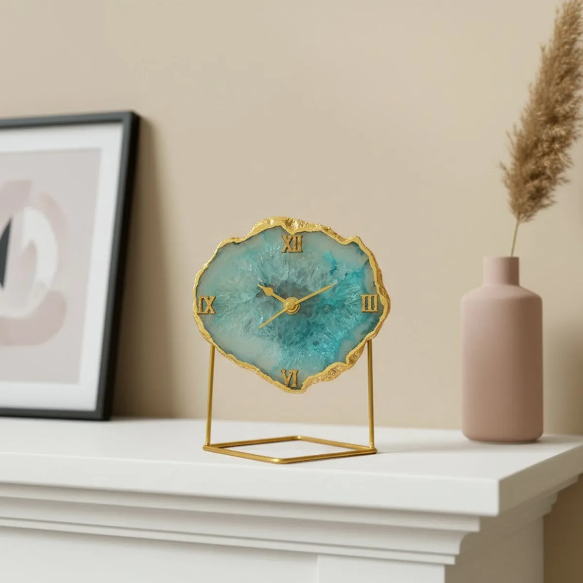 Turquoise agate table clock on a white mantel beside a vase