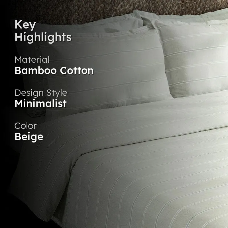 Beige striped duvet cover set shown in a bedroom styling view.
